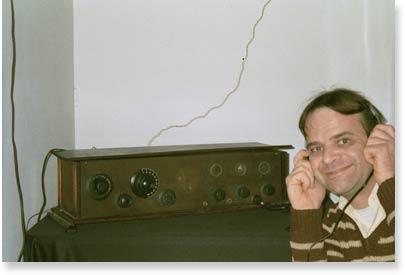 The author, listening to one of his antique radios.